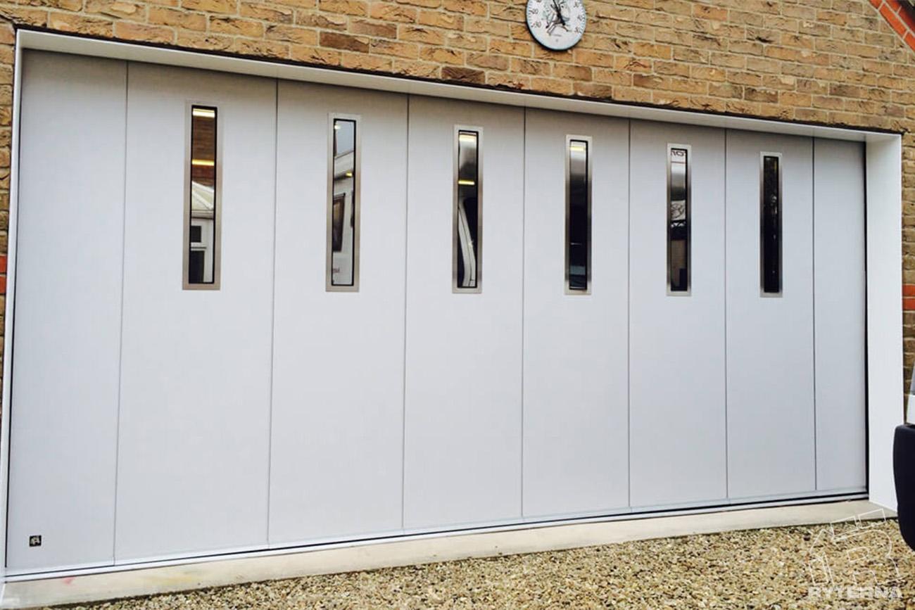 Side sliding garage doors